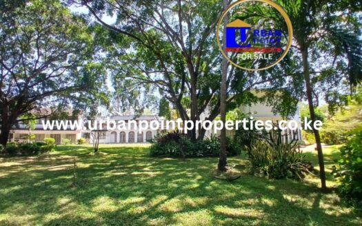 2.4 Acres in the heart of old nyali greenwood with 3 house units